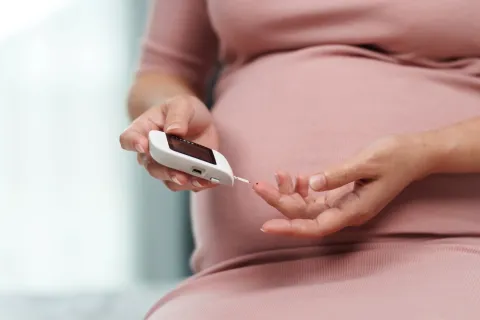 A Pregnant Women checking her diabetes status