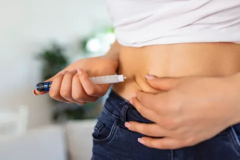 A Person trying to perform insulin test