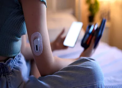 a child is monitoring glucose levels