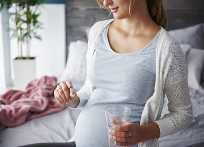 A pregnant women taking medication